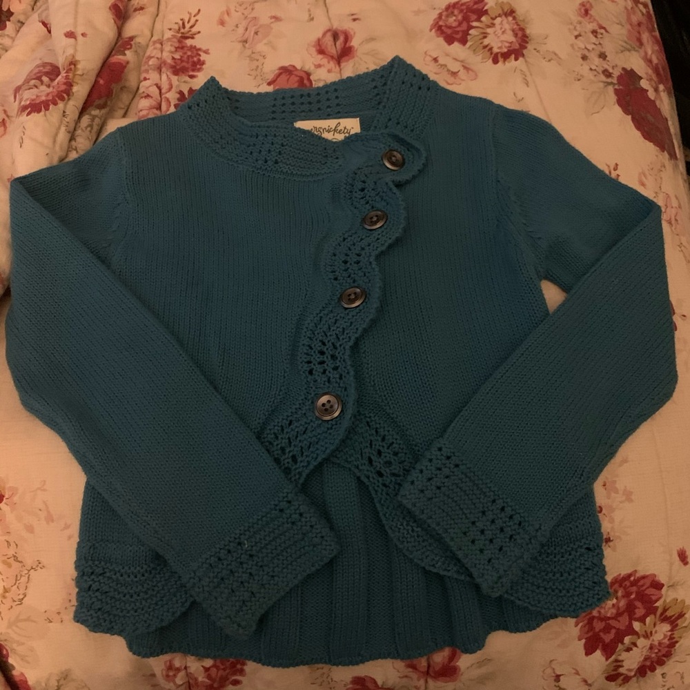 Persnickety cardigans have teal size 5